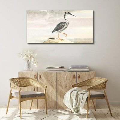 Tableau sur toile Un oiseau migrateur sur fond de nature