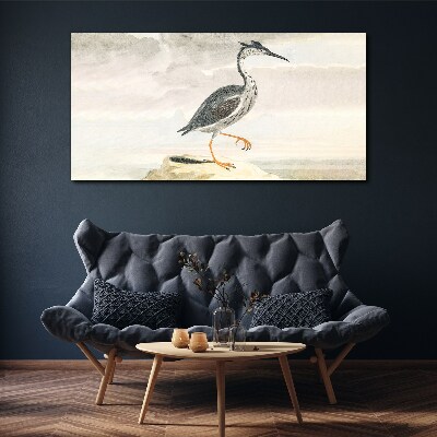 Tableau sur toile Un oiseau migrateur sur fond de nature
