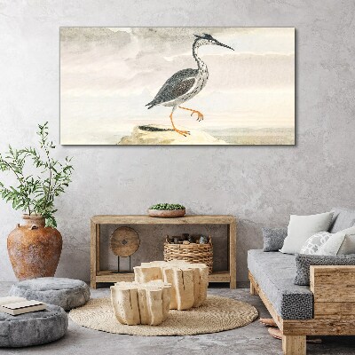 Tableau sur toile Un oiseau migrateur sur fond de nature