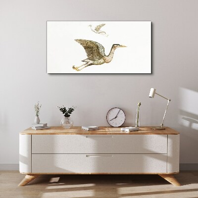 Tableau imprimé sur toile Le vol d'un oiseau au-dessus d'une eau calme