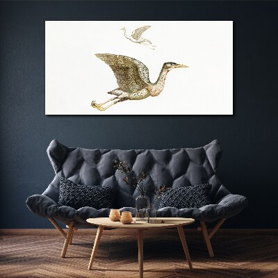 Tableau imprimé sur toile Le vol d'un oiseau au-dessus d'une eau calme