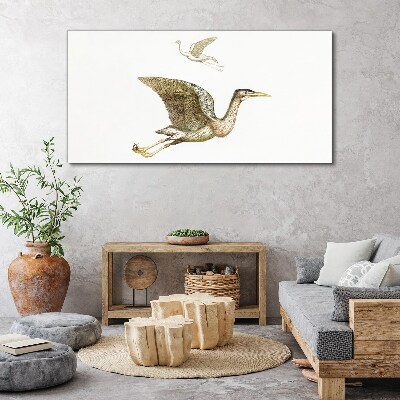 Tableau imprimé sur toile Le vol d'un oiseau au-dessus d'une eau calme