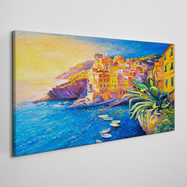 Tableau sur toile Une ville colorée au bord de la mer