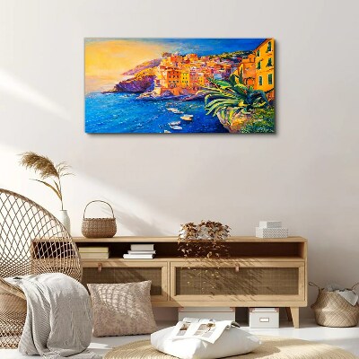 Tableau sur toile Une ville colorée au bord de la mer