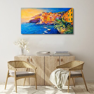 Tableau sur toile Une ville colorée au bord de la mer