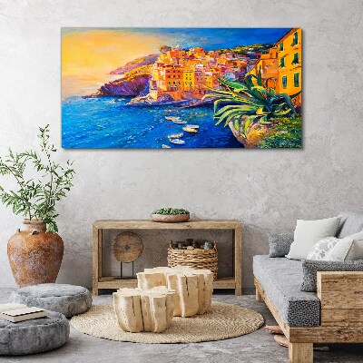 Tableau sur toile Une ville colorée au bord de la mer