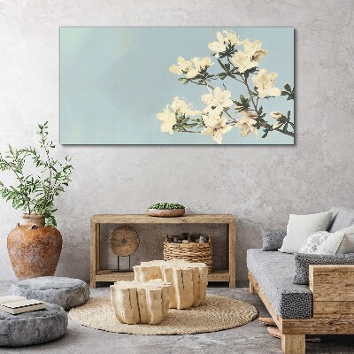 Tableau sur toile Composition florale sur fond bleu