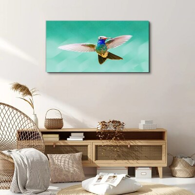 Tableau toile imprimée Colibri sur fond bleu
