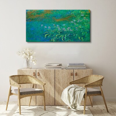 Tableau sur toile Paysage vert avec des fleurs