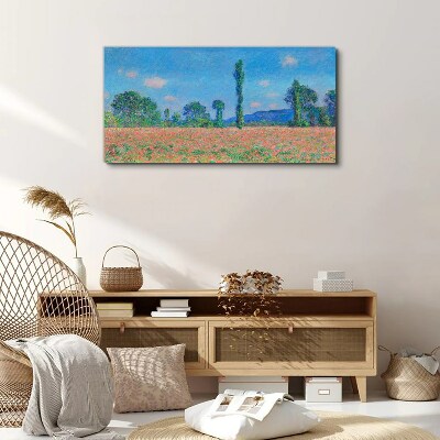Tableau sur toile Un champ de fleurs sous un ciel bleu