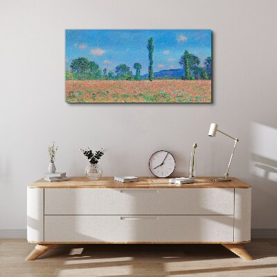 Tableau sur toile Un champ de fleurs sous un ciel bleu