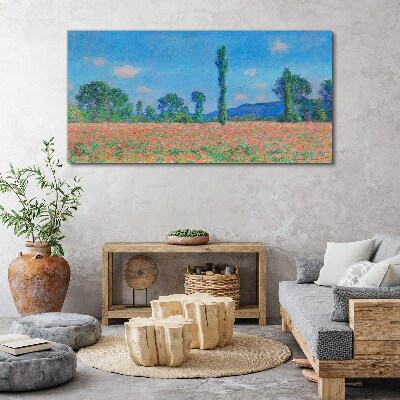 Tableau sur toile Un champ de fleurs sous un ciel bleu