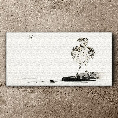 Tableau sur toile Un oiseau sur un fond minimaliste