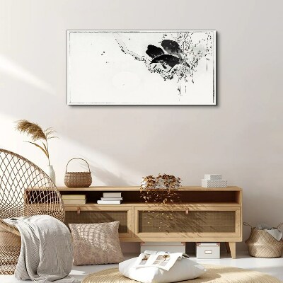 Tableau imprimé sur toile Oiseaux noirs sur une branche