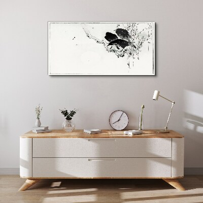 Tableau imprimé sur toile Oiseaux noirs sur une branche