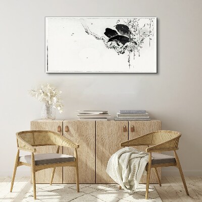 Tableau imprimé sur toile Oiseaux noirs sur une branche