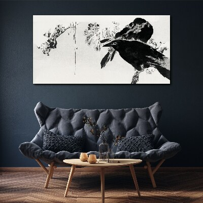Tableau sur toile Un oiseau noir sur fond de nature
