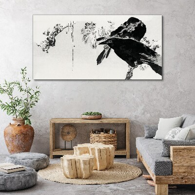 Tableau sur toile Un oiseau noir sur fond de nature