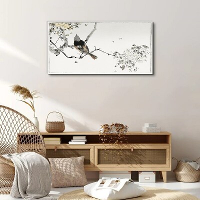 Tableau imprimé sur toile Un oiseau sur une branche aux couleurs délicates