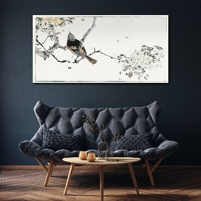 Tableau imprimé sur toile Un oiseau sur une branche aux couleurs délicates
