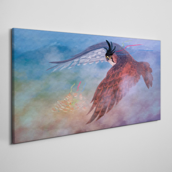 Tableau imprimé sur toile Vol d'un oiseau de proie dans les nuages