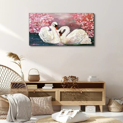 Tableau sur toile L'amour des cygnes dans un verger en fleurs