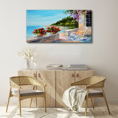 Tableau imprimé sur toile Fleurs et mer dans un paysage ensoleillé