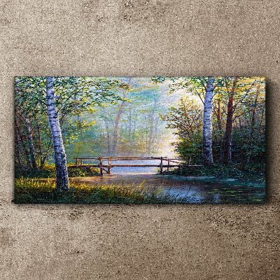 Tableau sur toile Un pont dans un paysage forestier