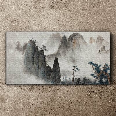 Tableau sur toile Paysage de montagne dans un paysage brumeux