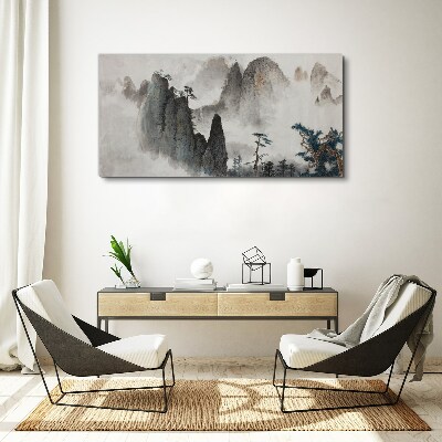 Tableau sur toile Paysage de montagne dans un paysage brumeux