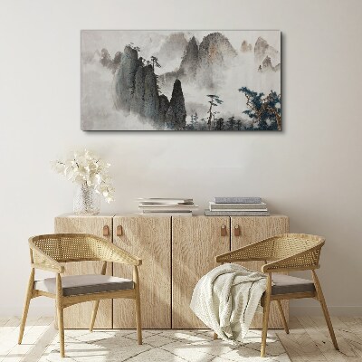 Tableau sur toile Paysage de montagne dans un paysage brumeux