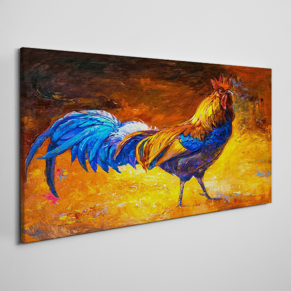 Tableau toile imprimée Un coq coloré sur fond de feu