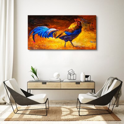 Tableau toile imprimée Un coq coloré sur fond de feu
