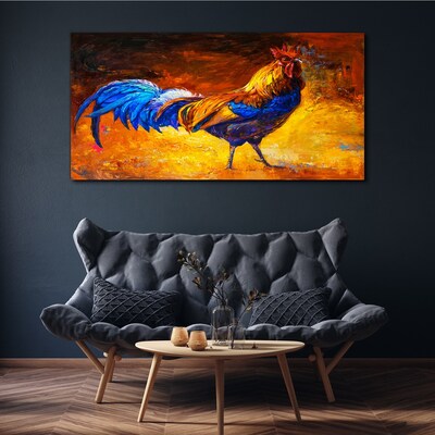 Tableau toile imprimée Un coq coloré sur fond de feu