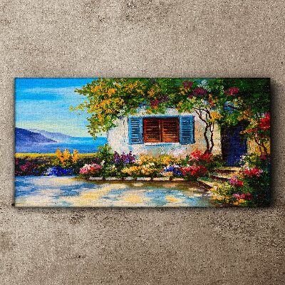 Tableau imprimé sur toile Paysage de bord de mer avec des fleurs