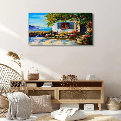 Tableau imprimé sur toile Paysage de bord de mer avec des fleurs