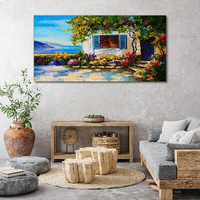 Tableau imprimé sur toile Paysage de bord de mer avec des fleurs