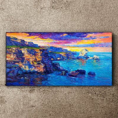 Tableau imprimé sur toile Un coucher de soleil pittoresque sur la côte