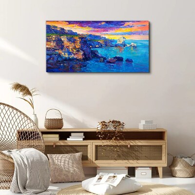 Tableau imprimé sur toile Un coucher de soleil pittoresque sur la côte