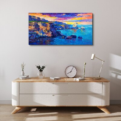 Tableau imprimé sur toile Un coucher de soleil pittoresque sur la côte
