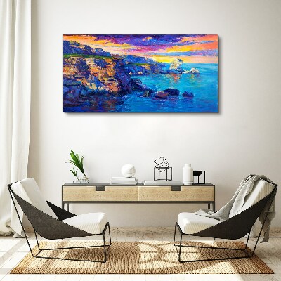 Tableau imprimé sur toile Un coucher de soleil pittoresque sur la côte