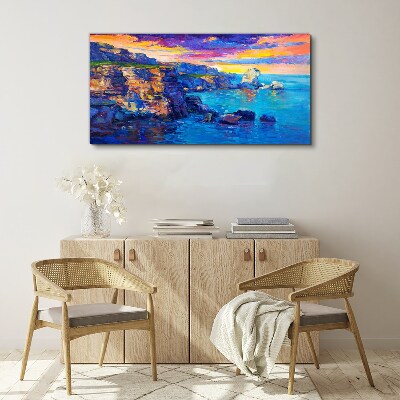 Tableau imprimé sur toile Un coucher de soleil pittoresque sur la côte