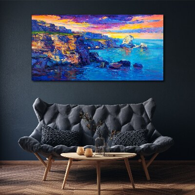 Tableau imprimé sur toile Un coucher de soleil pittoresque sur la côte