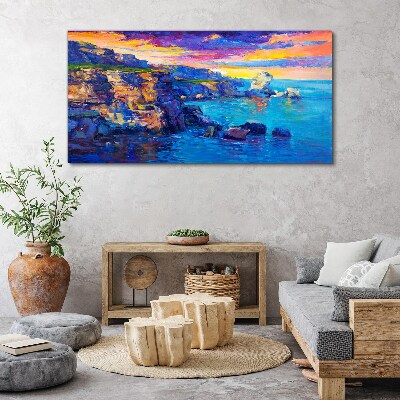 Tableau imprimé sur toile Un coucher de soleil pittoresque sur la côte