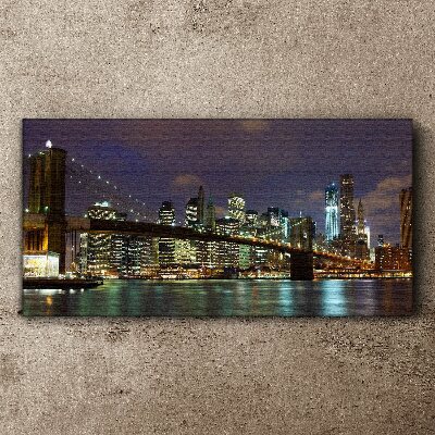 Tableau sur toile Le pont de Brooklyn dans la lueur nocturne