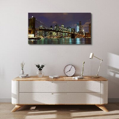 Tableau sur toile Le pont de Brooklyn dans la lueur nocturne