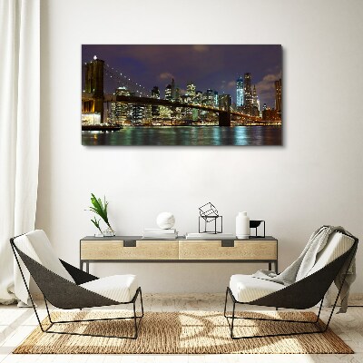 Tableau sur toile Le pont de Brooklyn dans la lueur nocturne