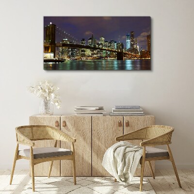 Tableau sur toile Le pont de Brooklyn dans la lueur nocturne