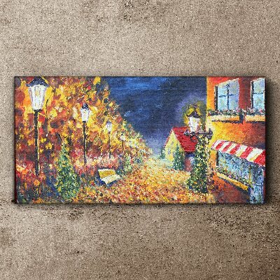 Tableau sur toile Avenue dorée à la lueur des lanternes