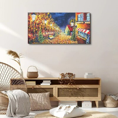 Tableau sur toile Avenue dorée à la lueur des lanternes